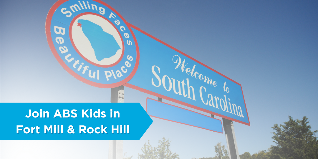 Welcome to South Carolina state sign with Join ABS Kids in Fort Mill and Rock Hill in white letters in lower left corner